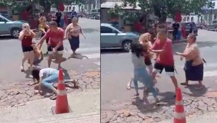 Dos mujeres a los golpes y un bebé cayendo al asfalto